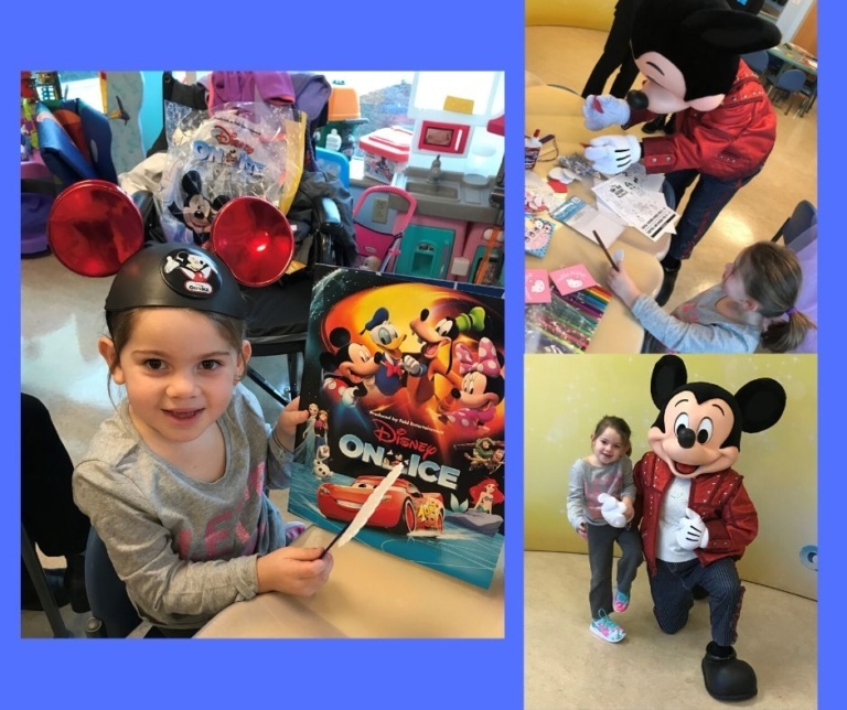 Taylor doing arts and crafts with Mickey Mouse at Sinai’s Children’s Hospital