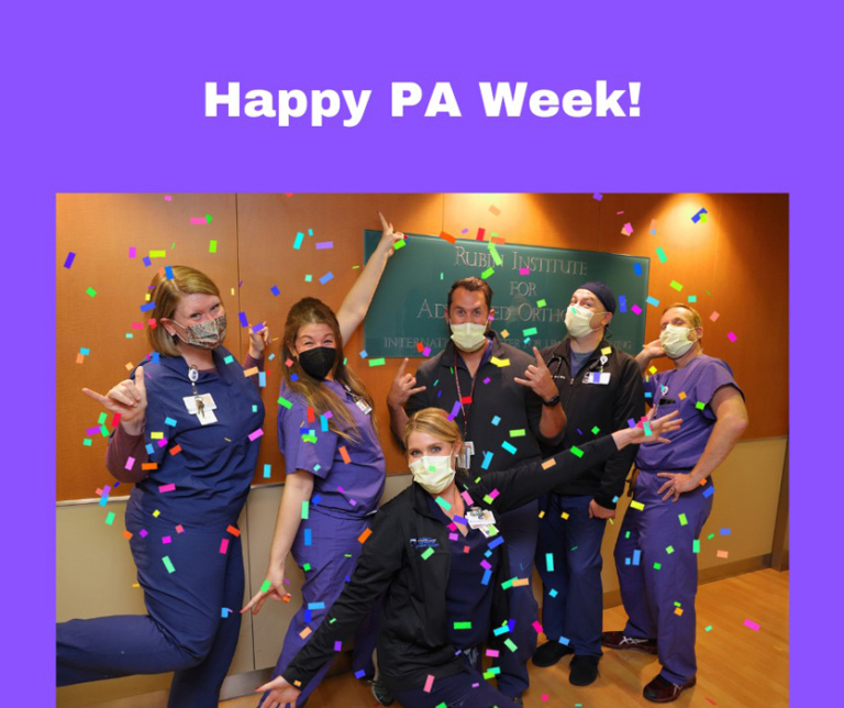 Six physician assistants in scrubs celebrating with confetti