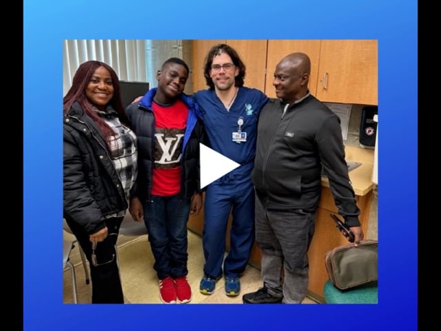 Thumbnail from a WBAL video of Dr. John Herzenberg walking with his patient Success Nworisa