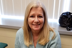 Cynthia, a patient of Dr. Janet Conway, smiling after treatment for bone infection