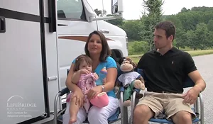 Mother and father discussing their journey to seek treatment for their daughter who has fibular hemimelia