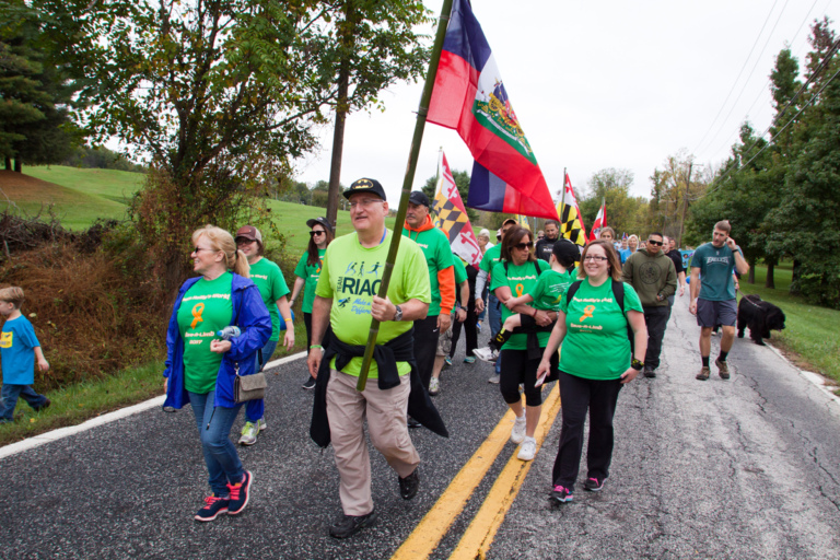 Dr. John Herzenberg walking with participants at Rubin Institute for Advanced Orthopedics 2017 Save-A-Limb Fund Event
