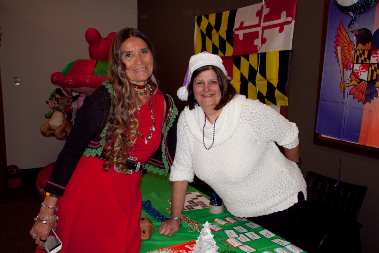 Pediatric Liaison Marilyn Richardson poses for a picture with a female volunteer at the International Center for Limb Lengthening pediatric holiday party