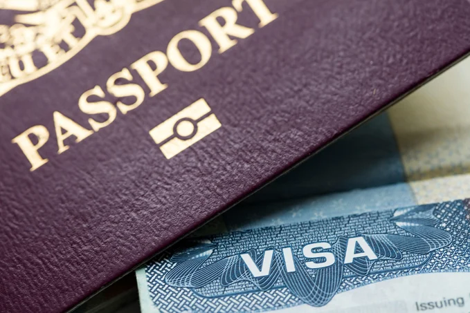 VISA document and an immigration passport