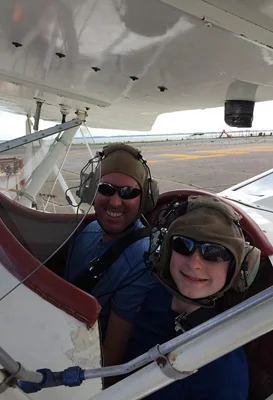 Gary and his father in a biplane