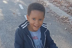 Leo smiling on his scooter after successful rotationplasty