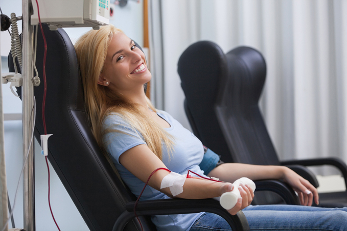 Woman smiling and donating blood before surgery at International Center for Limb Lengthening