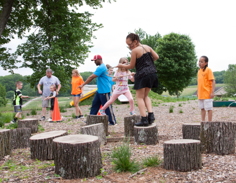 Two teams competing in the Survivor Challenge led by Earl Cole