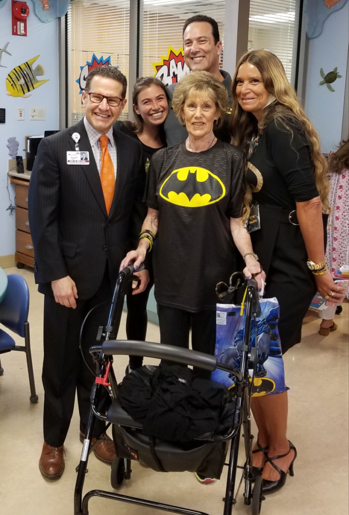 LifeBridge Health President and CEO of LifeBridge Health with donors, Lenny “Batman” Robinson’s family, and Pediatric Liaison Marilyn Richardson