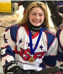 Brooklynn with the Women’s U.S. National Para-Ice Hockey Team gold medal from the Para-Ice Hockey World Cup held in Ostrava in the Czech Republic