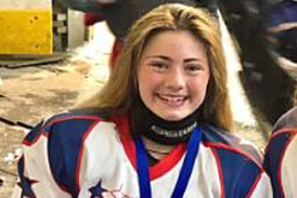 Brooklynn with the Women’s U.S. National Para-Ice Hockey Team gold medal from the Para-Ice Hockey World Cup held in Ostrava in the Czech Republic