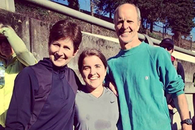 Hannah with her parents after completing a half marathon in less than 2 hours in 2014–exactly 10 years after her first surgery in 2004.