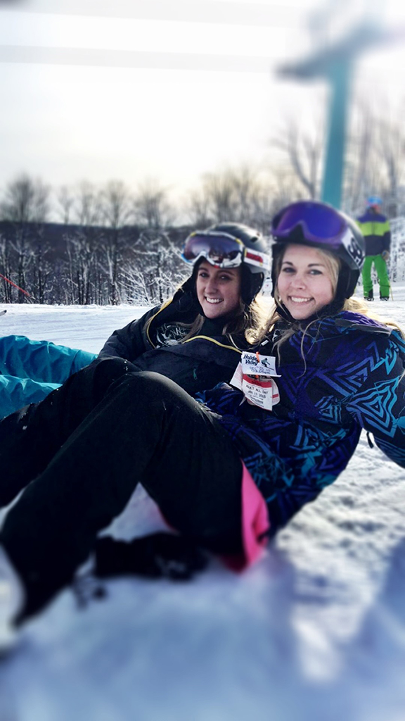 Emily skiing with a friend