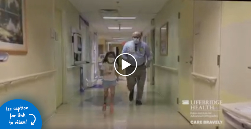 Dr. John Herzenberg running with a patient