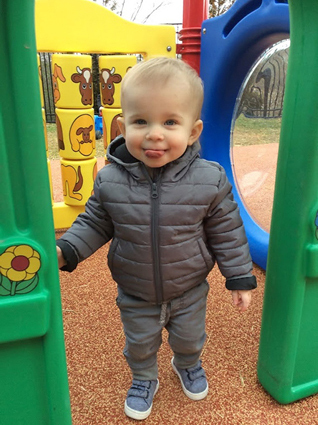 Cannon playing at a playground after treatment