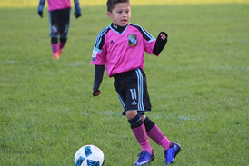 JJ playing soccer after treatment