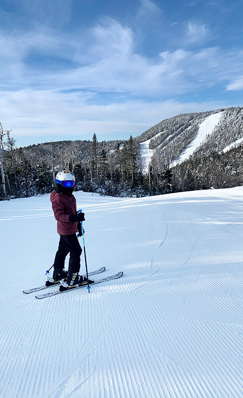 Jadon skiing in the snow on a mountain