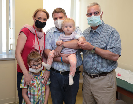 Lara with her family and Dr. Standard before surgery