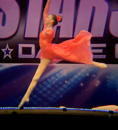 Cassidy as a teenager leaping in her first prize-winning performance at the world dance championships