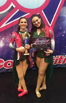 Cassidy as a teenager with her older sister Abby with their first-place award in the Imagine National Dance Challenge