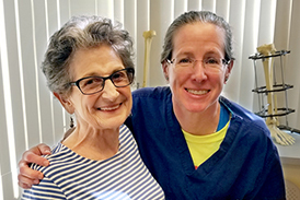 Elaine and Dr. Janet Conway smiling at a clinic follow-up appointment