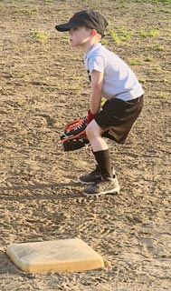 Jackson guarding a baseball base