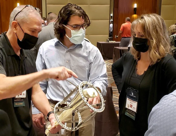 Dr. Philip McClure demonstrating deformity correction on an external fixator